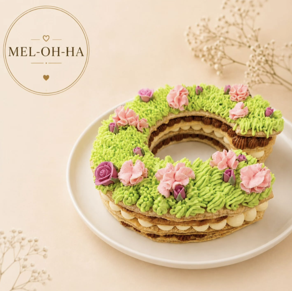 Custom shaped MEL-OH-HA milhoja with floral piping
